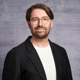Porträt-Foto von Dr. Hans-Jörg Dennig